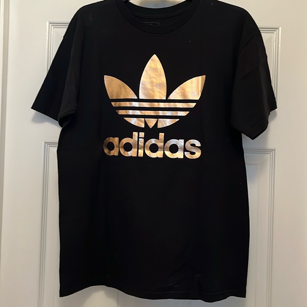 adidas black cotton t-shirt with shiny logo front and back.